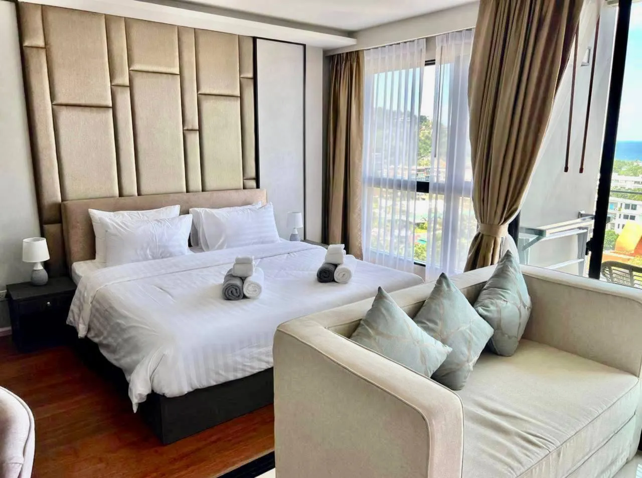 Bedroom of an apartment with a sea view