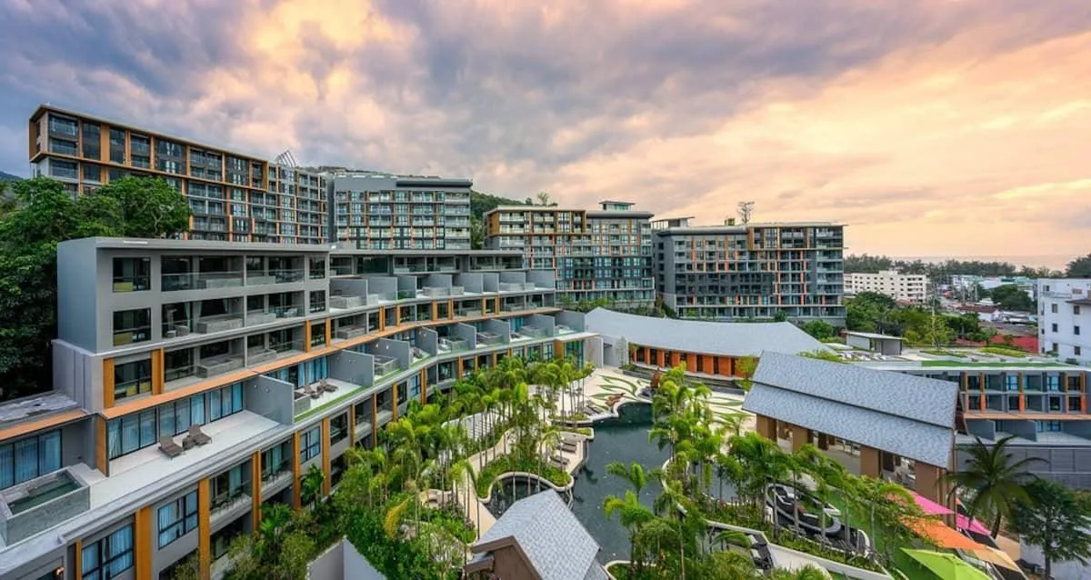 Buildings of the Mida Grande Resort complex at sunset